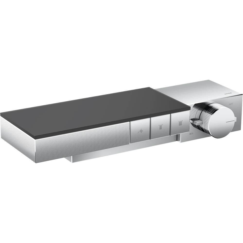 Chrome thermostatic shower trim with rectangular backplate, three control buttons, and circular temperature dial on right sid
