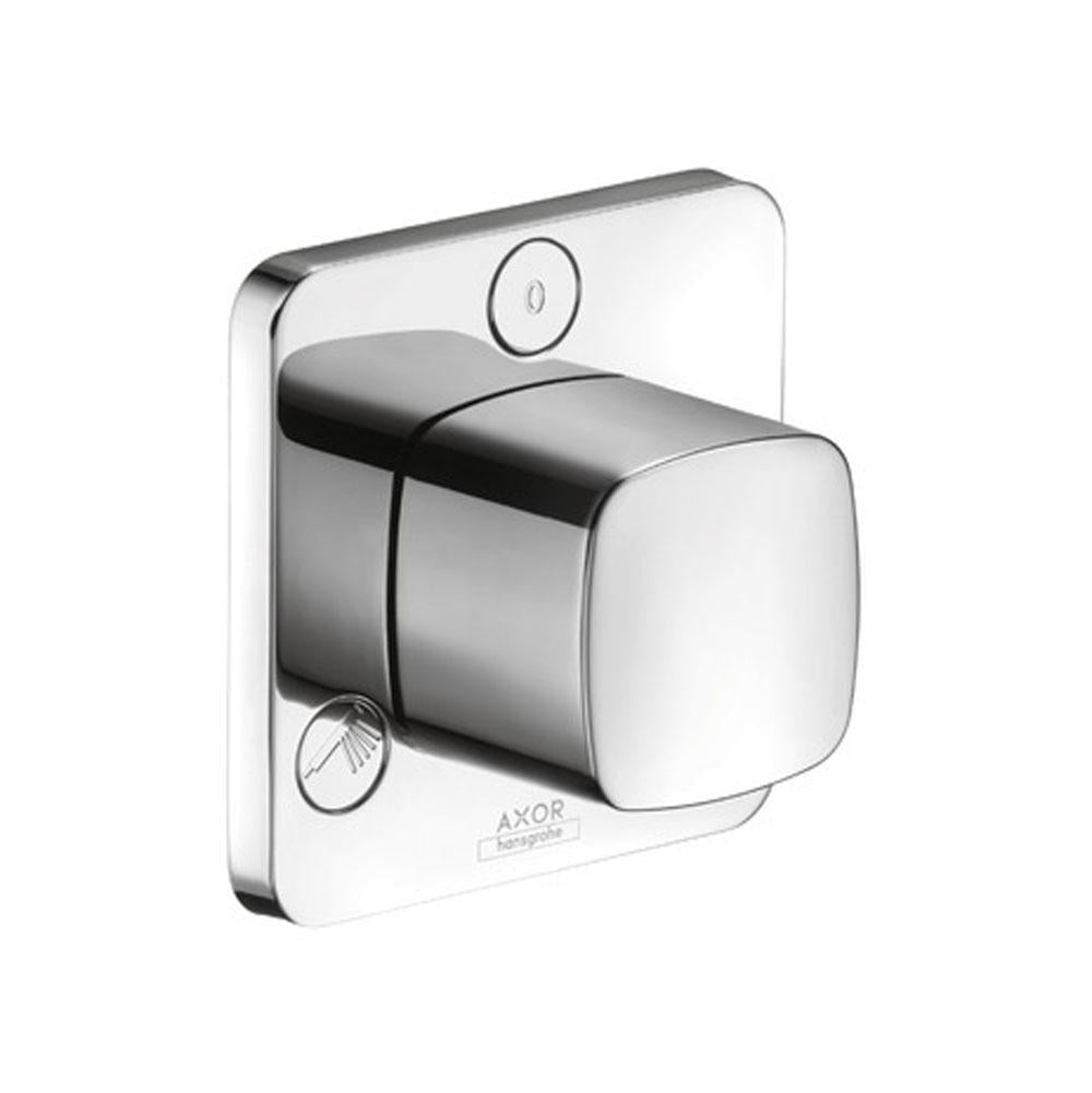 Chrome diverter trim with rounded square handle, circular control button, and leaf-shaped accent on white rectangular escutch
