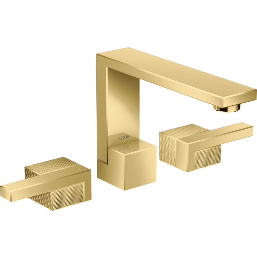 Polished gold widespread bathroom faucet with diamond cut texture, featuring a tall spout and two matching lever handles.