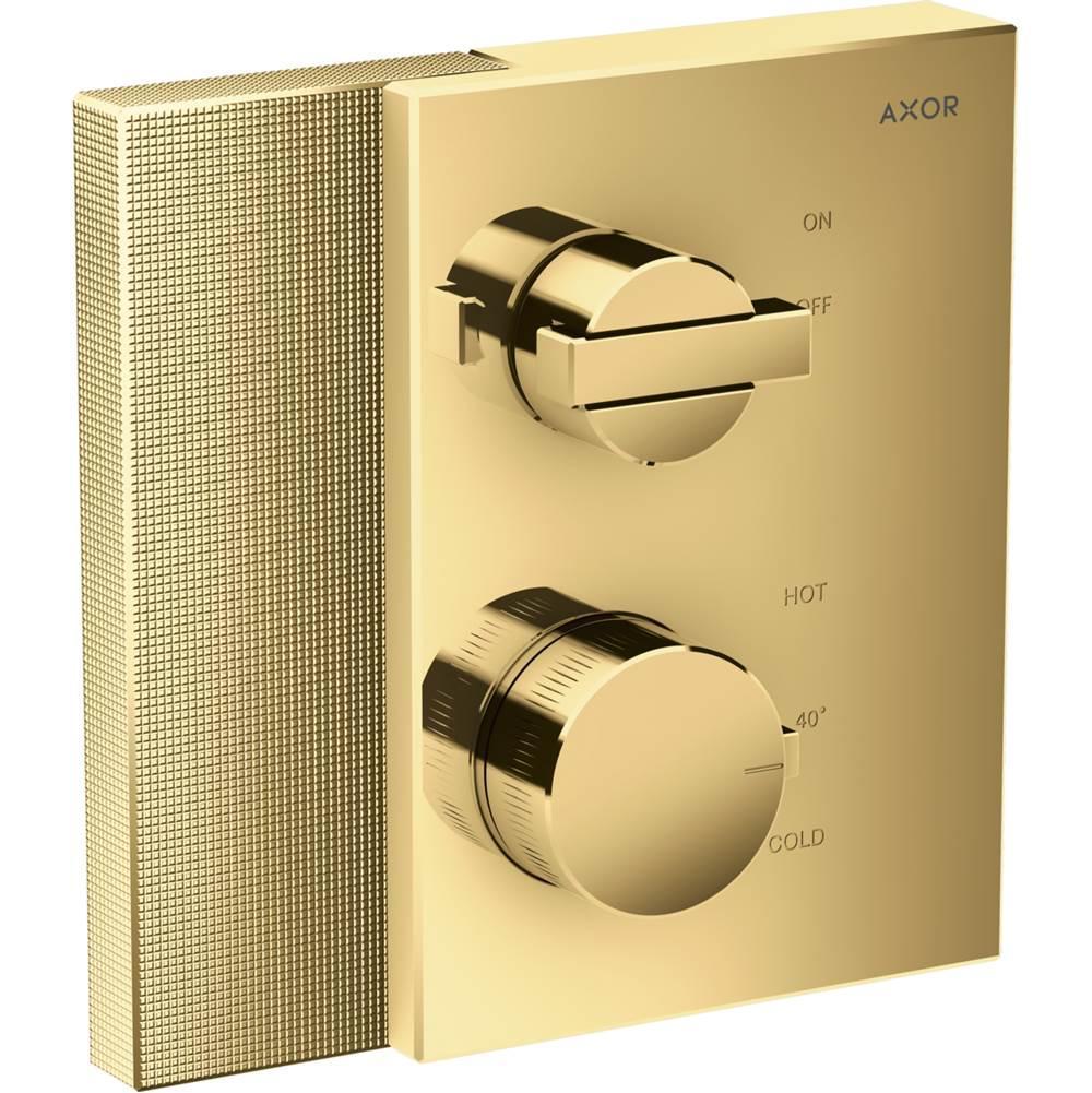 Polished gold thermostatic shower trim with diamond-cut texture featuring volume control lever and temperature dial with on/o