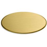 Oval brushed brass finish sample chip with textured surface and beveled edge.