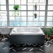 Biscuit rectangular soaking bathtub with two raised seats, armrests, and grab bars installed in bathroom with city skyline vi