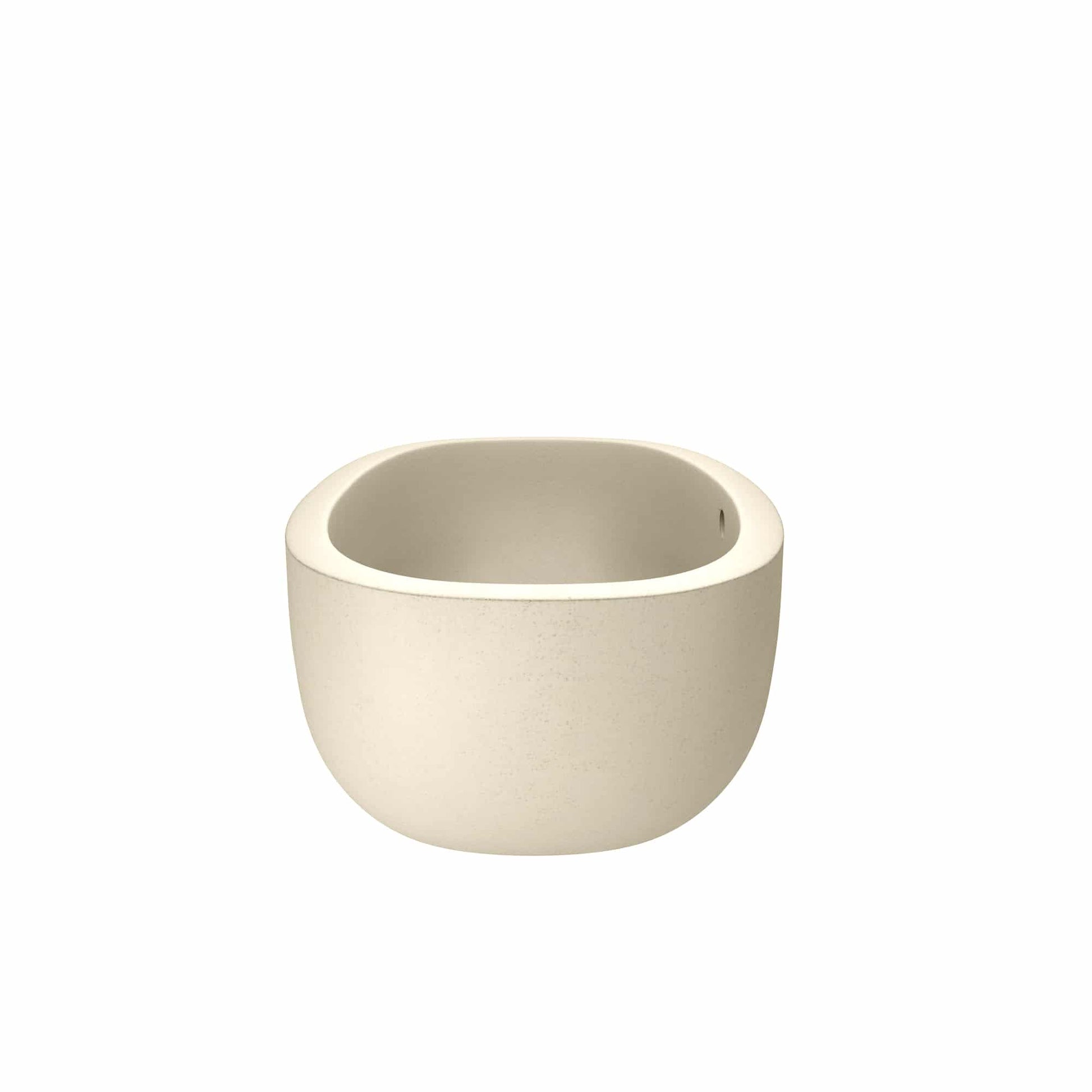 Sand-colored round soaking bathtub with smooth curved sides and interior basin.