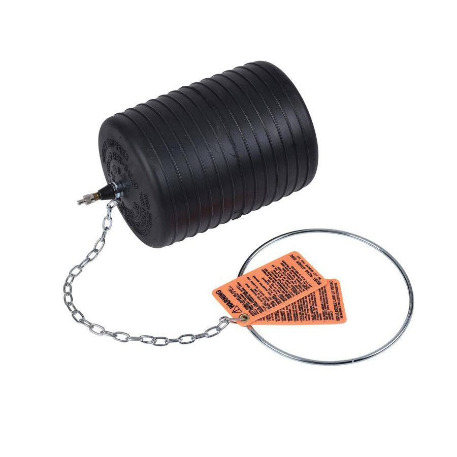 Black ribbed test-ball plug with metal chain, ring, and orange warning tags attached.