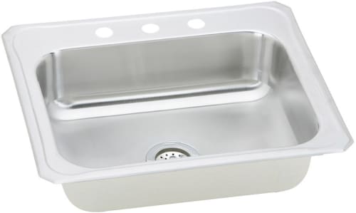 Stainless steel drop-in sink with single bowl, four mounting holes, and drain fixture visible.
