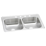 Stainless steel double bowl drop-in sink with four holes and white rim, viewed from above at an angle.