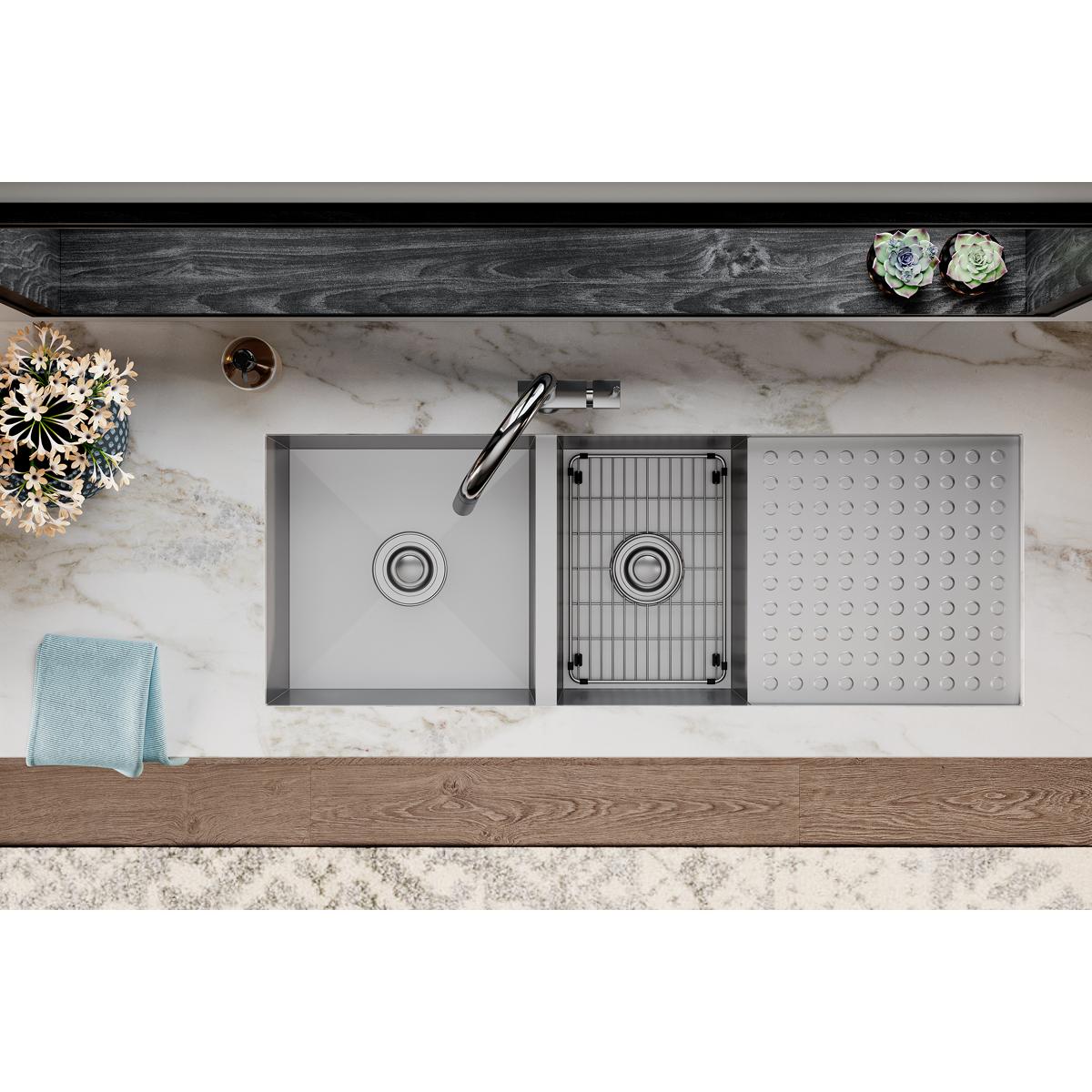 Stainless steel sink bottom grid with vertical ridges and mounting clips for Elkay Crosstown sink basin.