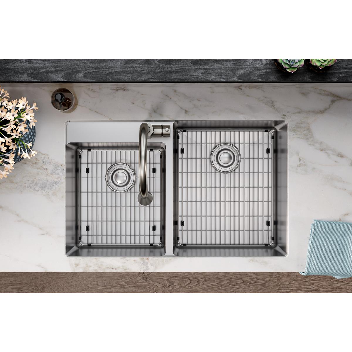 Stainless steel sink grid with vertical ribbed pattern and circular drain opening.