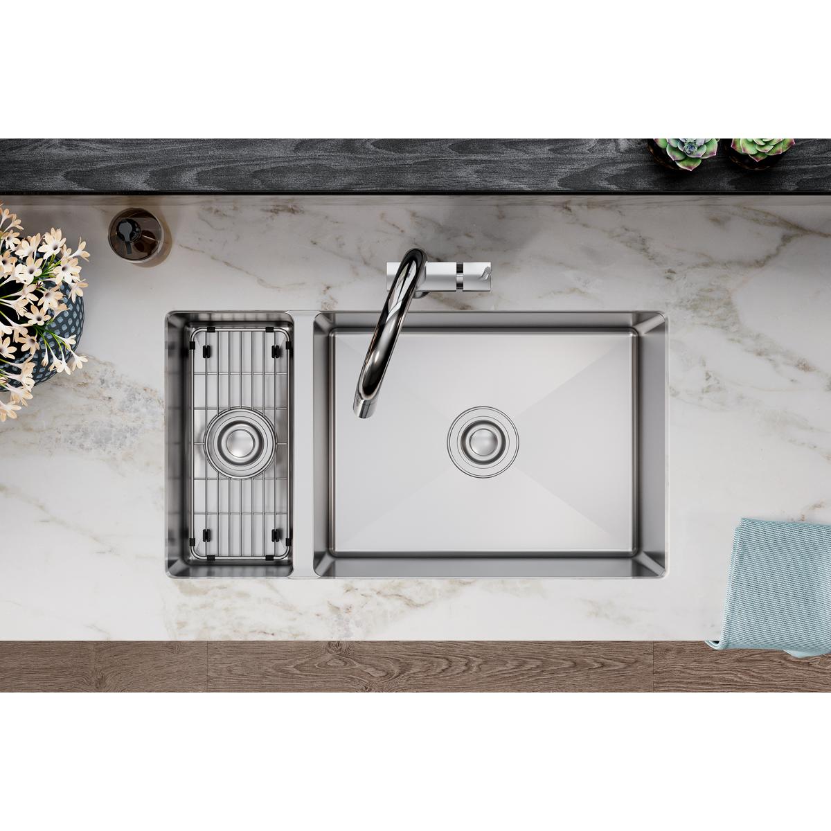 Stainless steel sink grid with vertical wire pattern in rectangular shape for undermount installation.