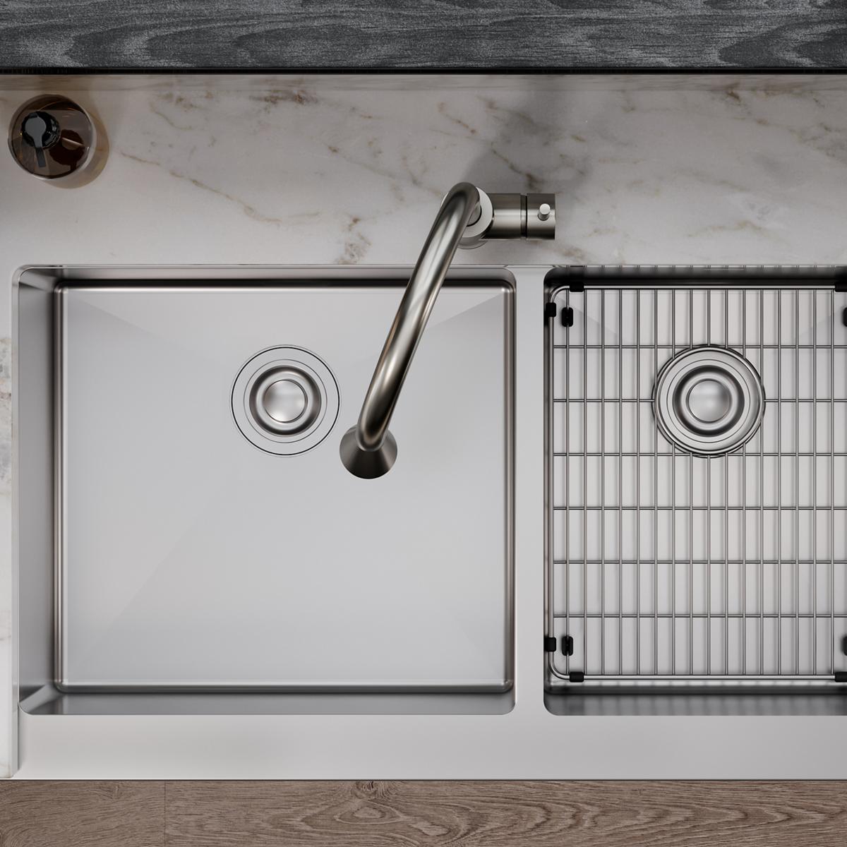 Stainless steel sink bottom grid with vertical slats and mounting clips, shown positioned in right basin of double sink.