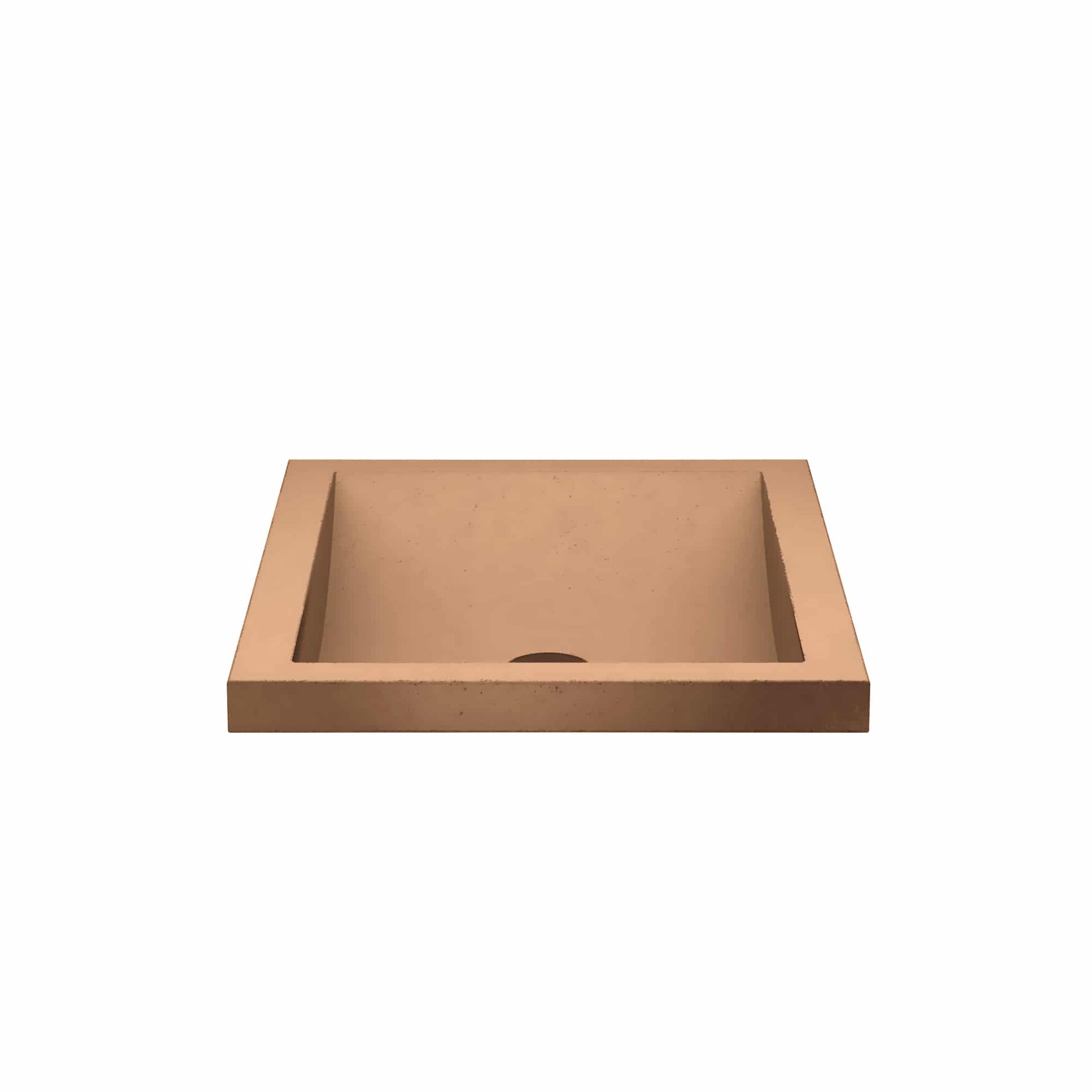 Terracotta rectangular bathroom sink with single drain hole and angled side walls.