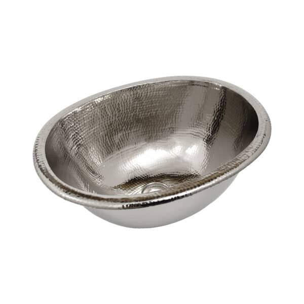Polished nickel oval bathroom sink with hammered interior surface and raised rim.