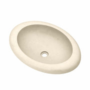 Sand-colored oval concrete sink with rounded rim and center drain hole.