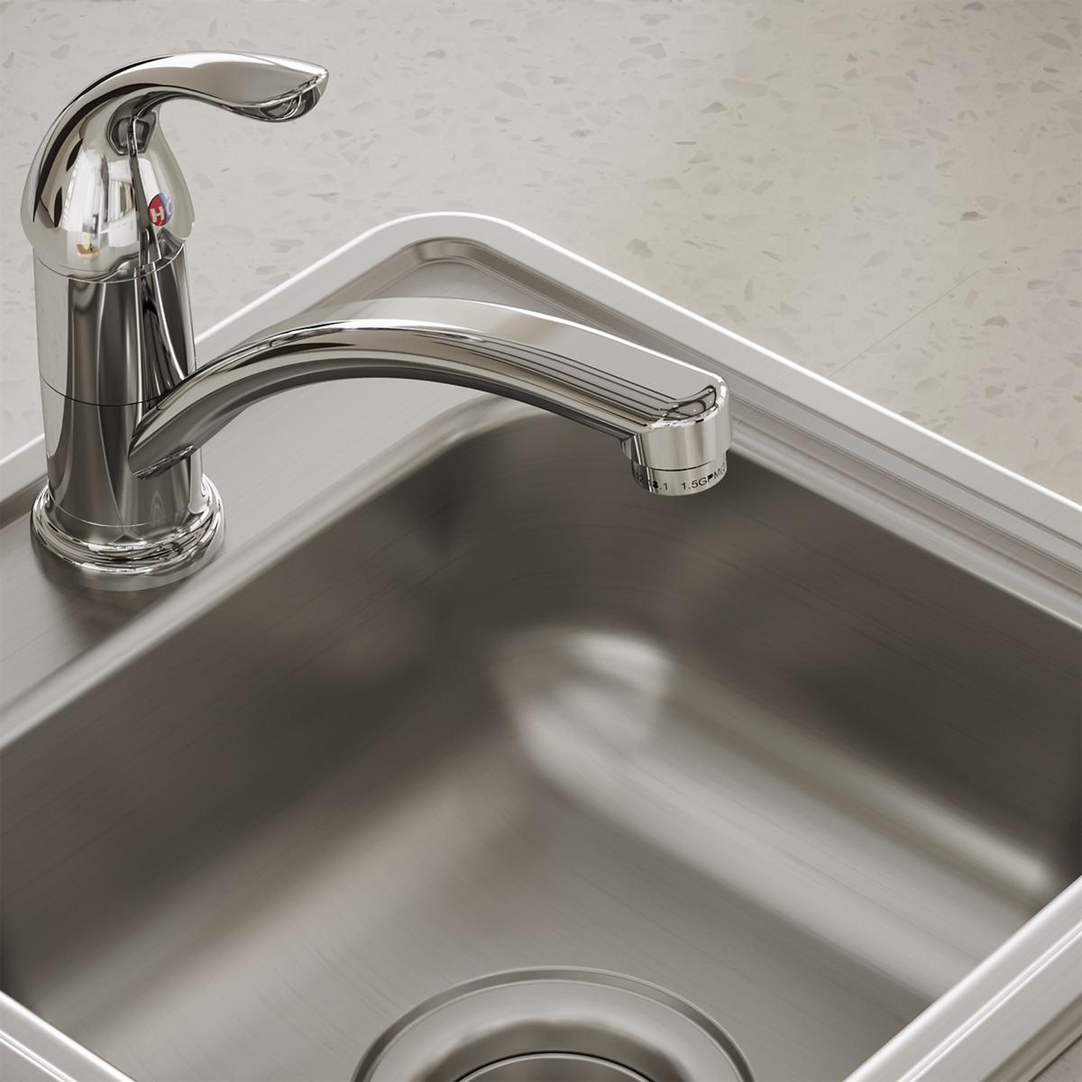 Stainless steel drop-in bar sink with single bowl and chrome faucet with curved spout.