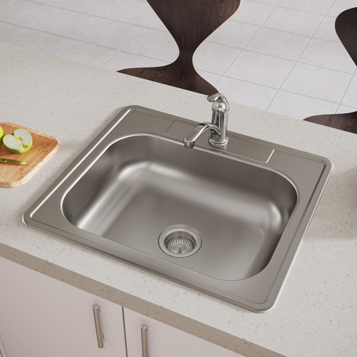Stainless steel drop-in sink with single bowl, drain strainer, and faucet hole, installed in countertop.