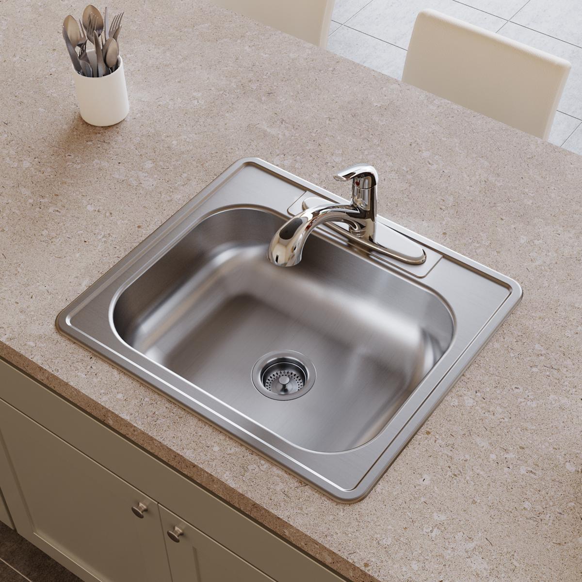 Stainless steel drop-in sink with single bowl, two holes, and chrome faucet installed in countertop.