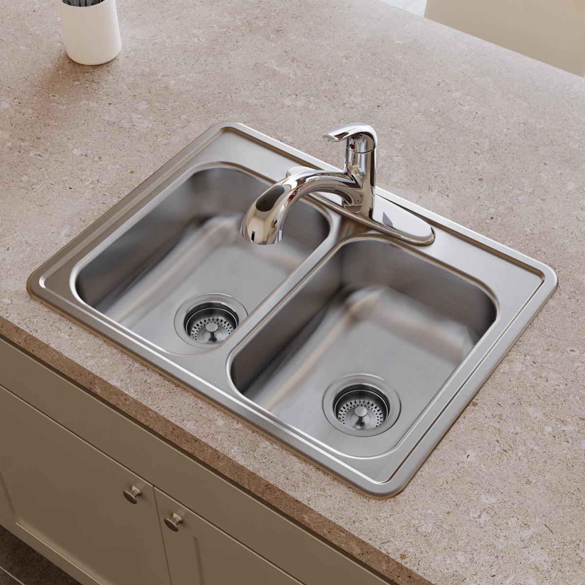 Stainless steel double bowl drop-in sink with two equal basins, drain strainers, and chrome faucet installed in countertop.