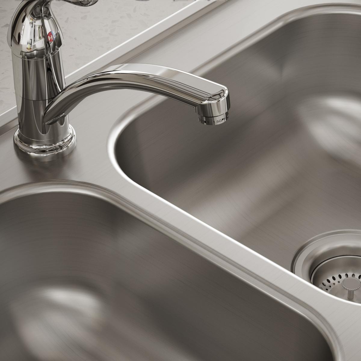 Stainless steel double bowl drop-in sink with chrome faucet and single hole installation.