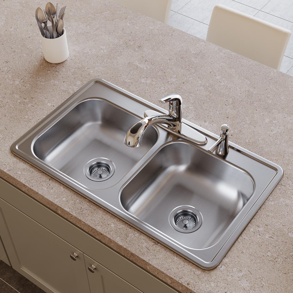 Stainless steel double bowl kitchen sink with two faucets and drain strainers installed in countertop.