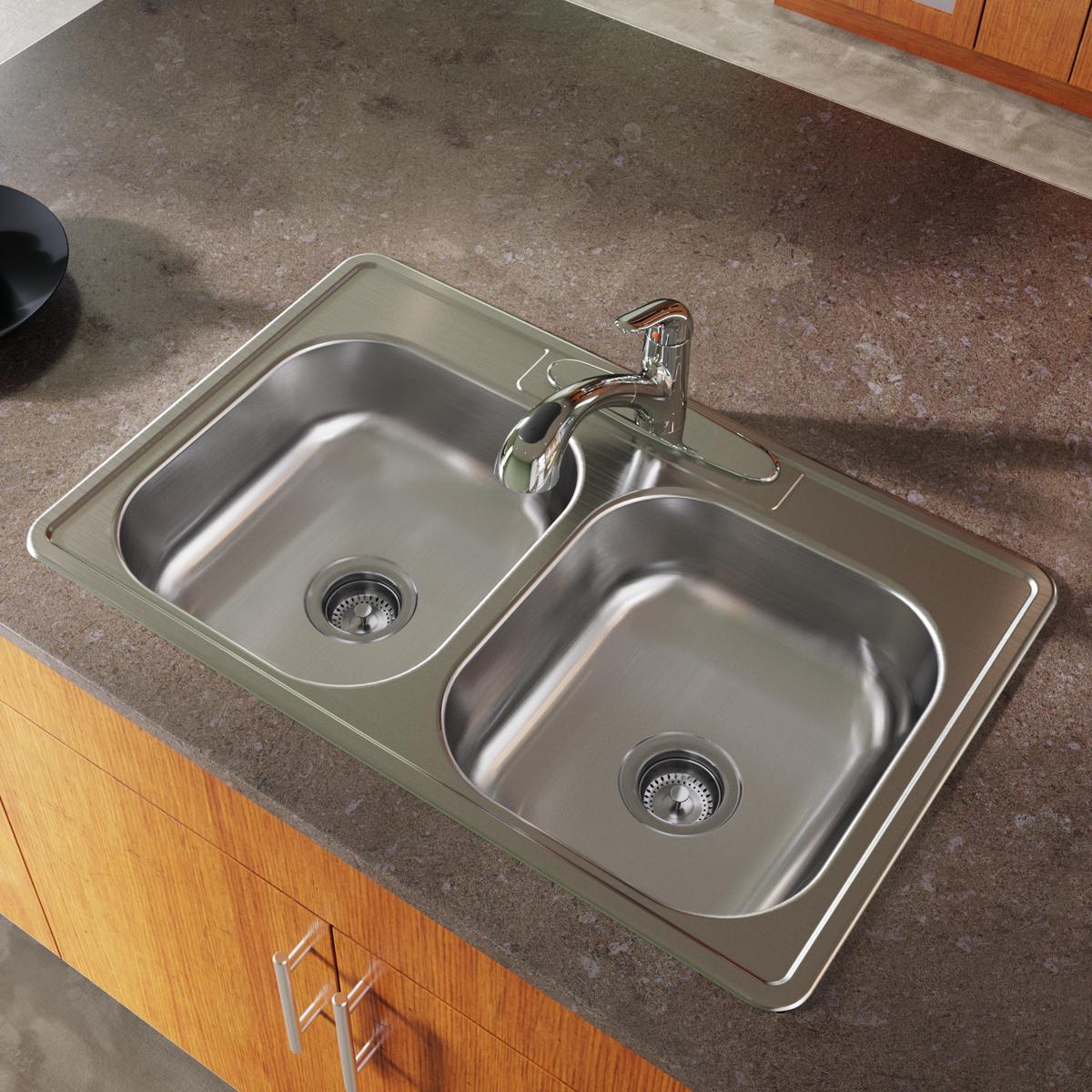 Stainless steel drop-in double bowl sink with equal-sized bowls, drain strainers, and single faucet hole installed in counter