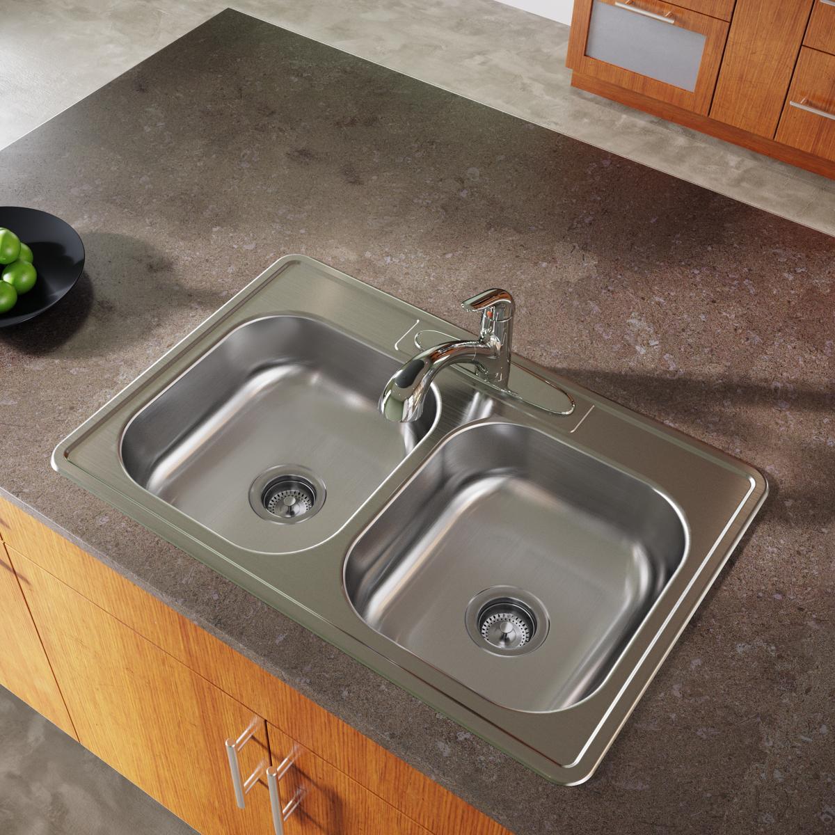Stainless steel double bowl drop-in sink with two drain holes and chrome faucet installed in gray countertop.