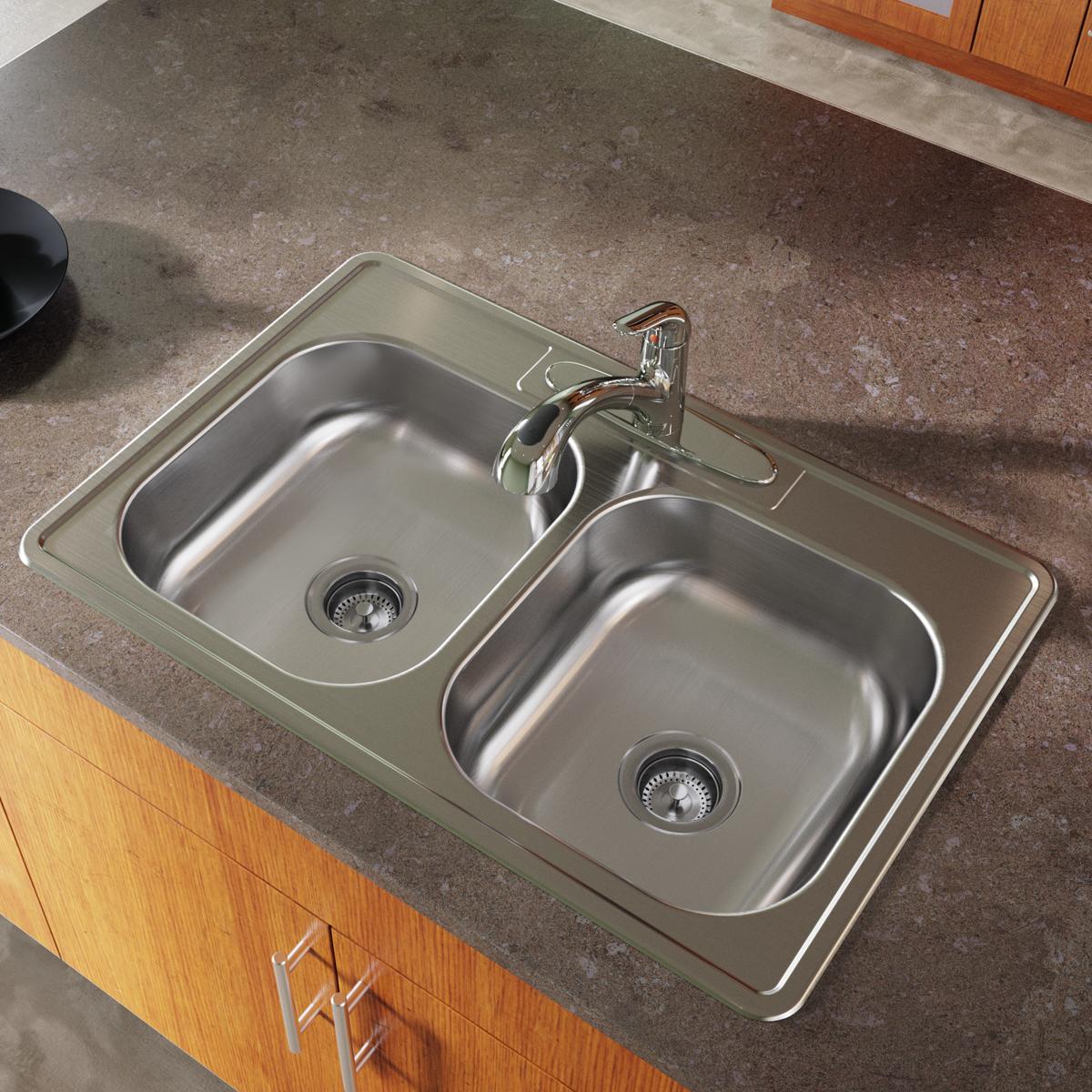 Stainless steel double bowl drop-in sink with two equal basins, drain strainers, and chrome faucet installed in countertop.