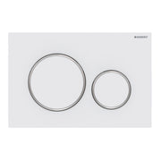 Matte white actuator plate with two chrome-rimmed circular buttons for dual flush control.