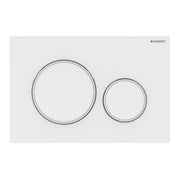 White rectangular actuator plate with two circular flush buttons, larger on left and smaller on right.
