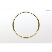 White square actuator plate with gold-toned circular ring and centered white button.