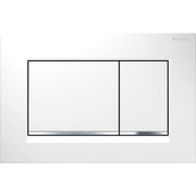 White rectangular toilet flush plate with two black-outlined buttons and chrome accent detail.