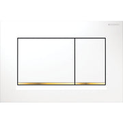 White rectangular dual-flush toilet plate with two buttons and polished gold accent strip at bottom.