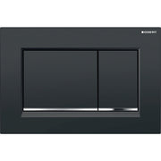 Black rectangular dual-flush toilet plate with two chrome-accented buttons and Geberit branding.