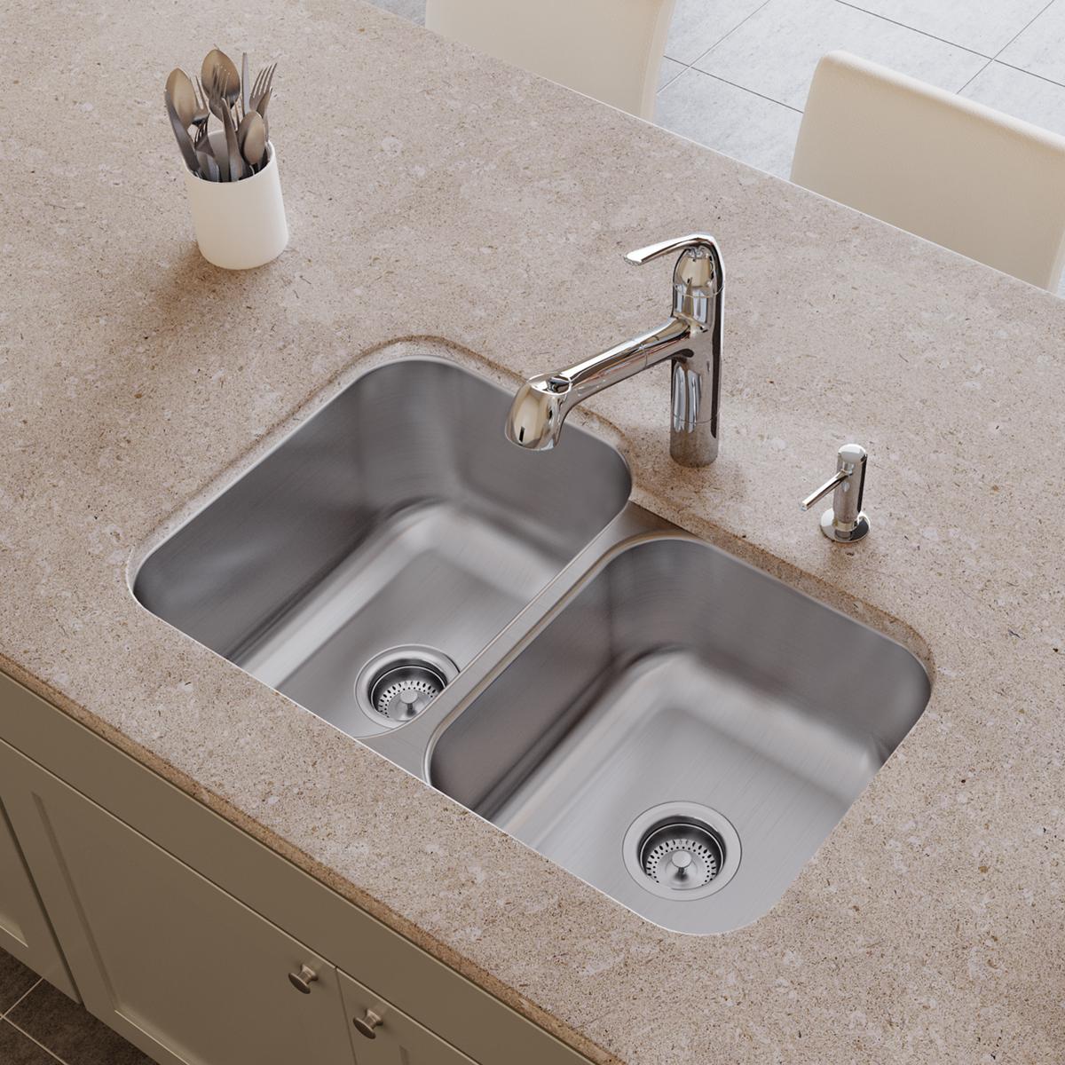 Stainless steel double bowl undermount sink with left and right compartments, dual drain strainers, and chrome faucet install