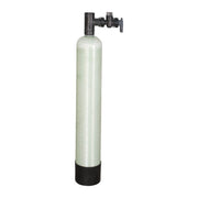 Tall cylindrical white water filter tank with black base and black valve assembly on top.