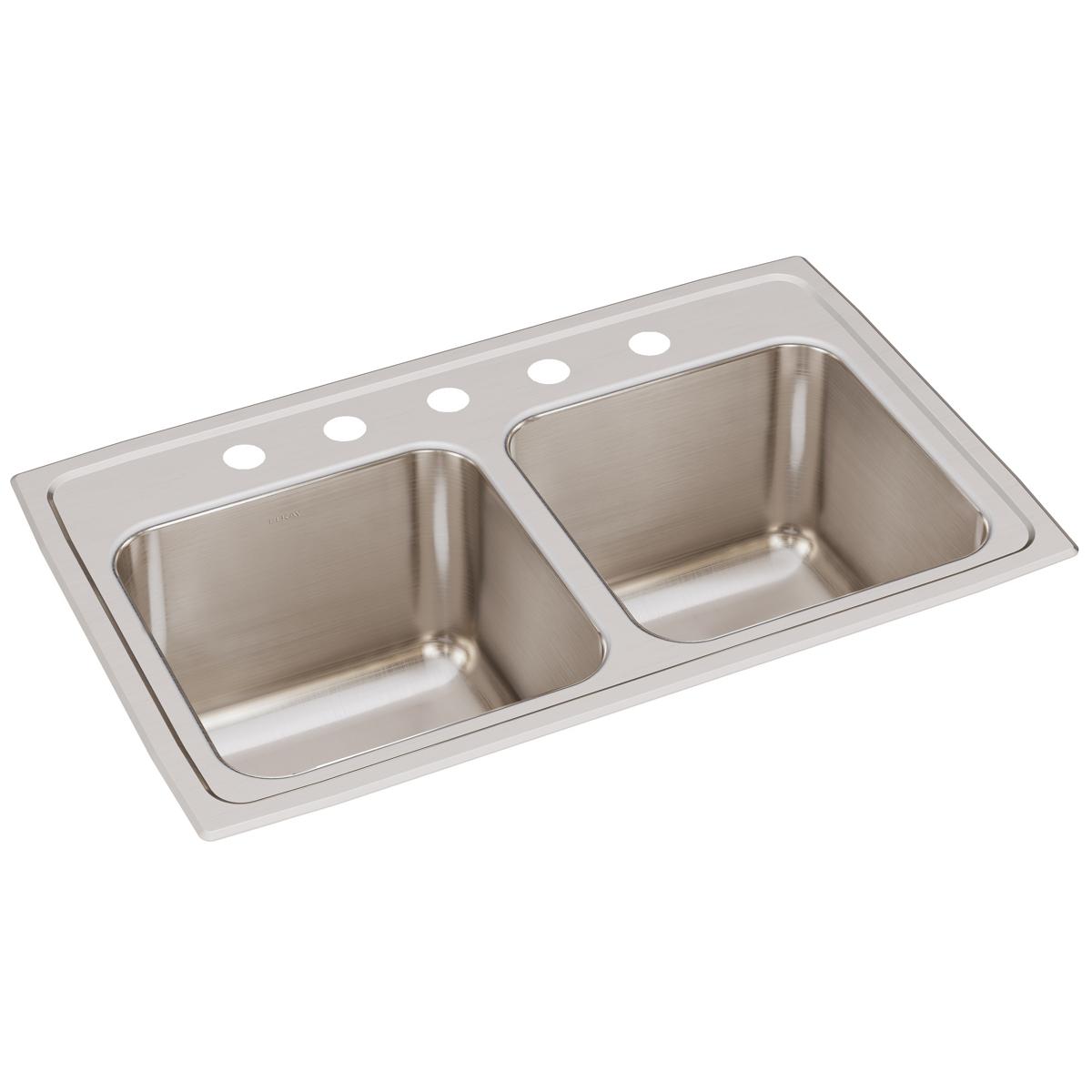 Stainless steel double bowl drop-in sink with five faucet holes across the rim.