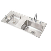 Stainless steel double bowl drop-in sink with two faucets and drain strainers.