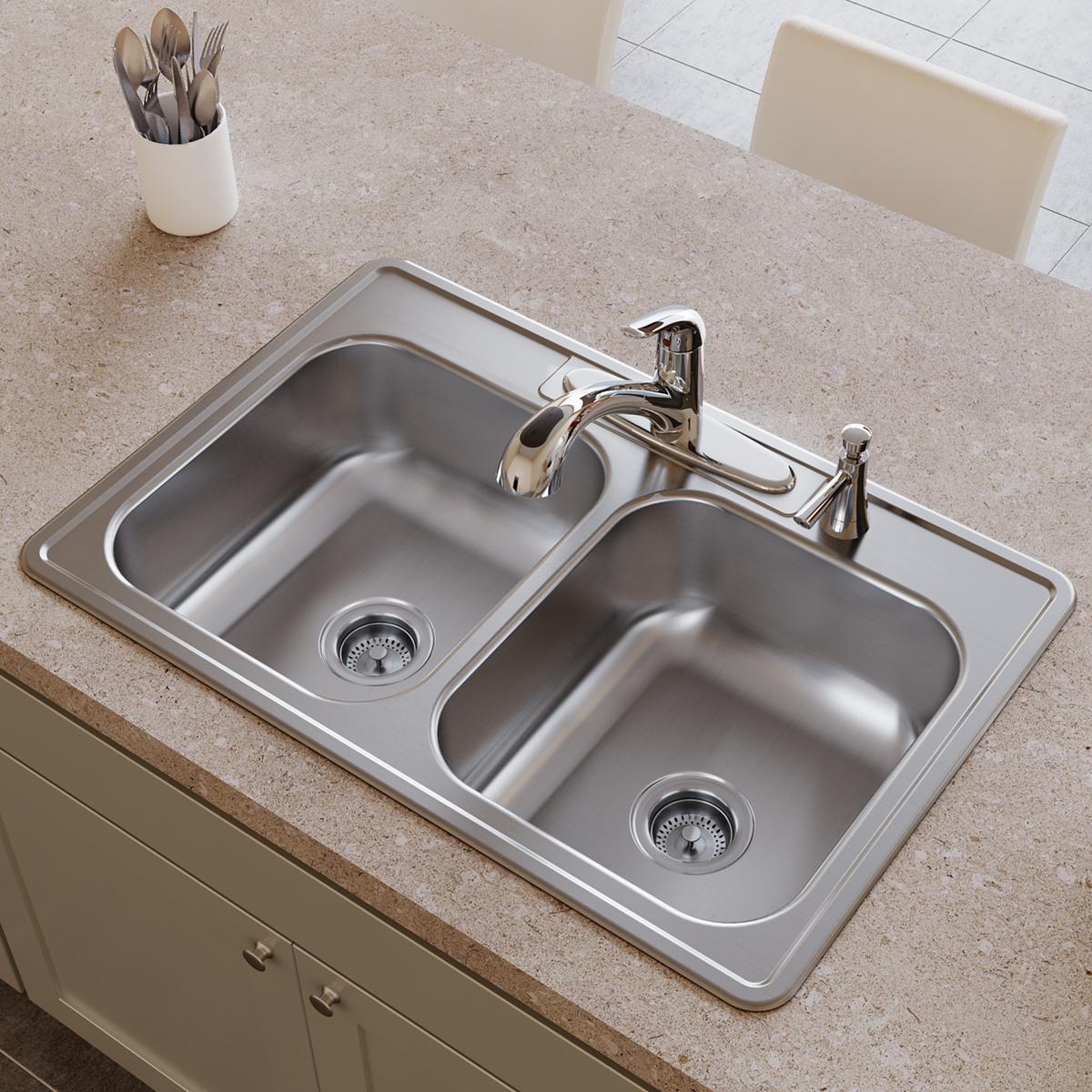 Stainless steel double bowl drop-in sink with two faucets and drain strainers installed in beige countertop.