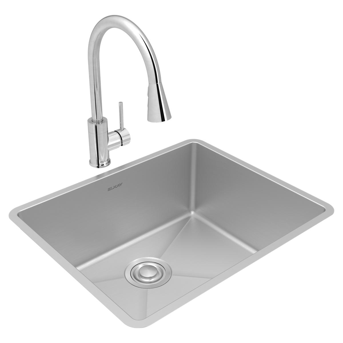 Stainless steel undermount sink bowl with chrome pull-down faucet and drain assembly.