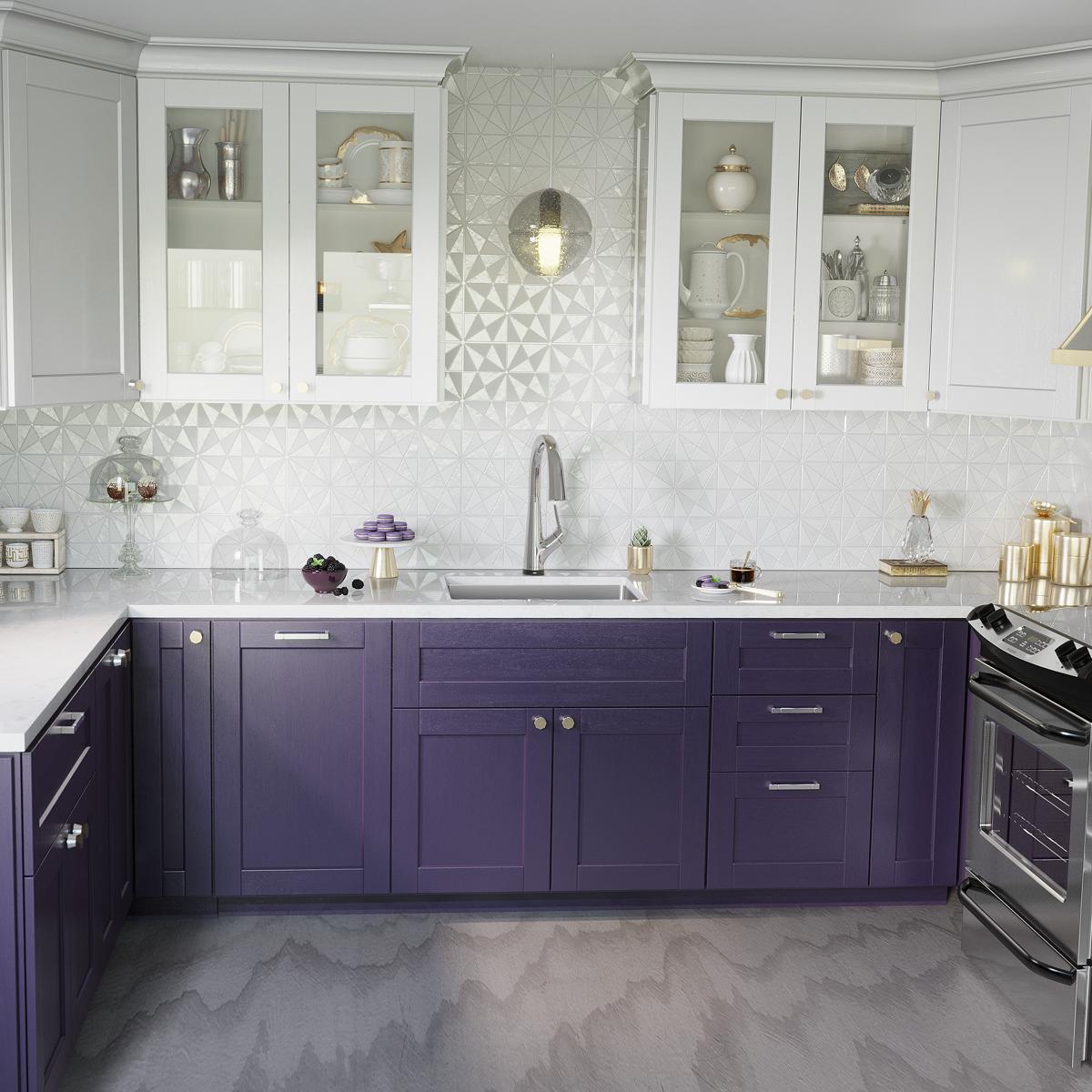 Stainless steel single bowl undermount sink with chrome filtered faucet installed in purple cabinetry kitchen counter.