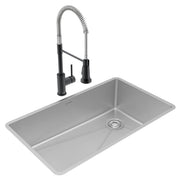 Stainless steel undermount sink with single bowl and black pull-down faucet with coiled spray hose.