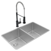 Stainless steel double bowl undermount sink with black pull-down faucet and drain assembly.