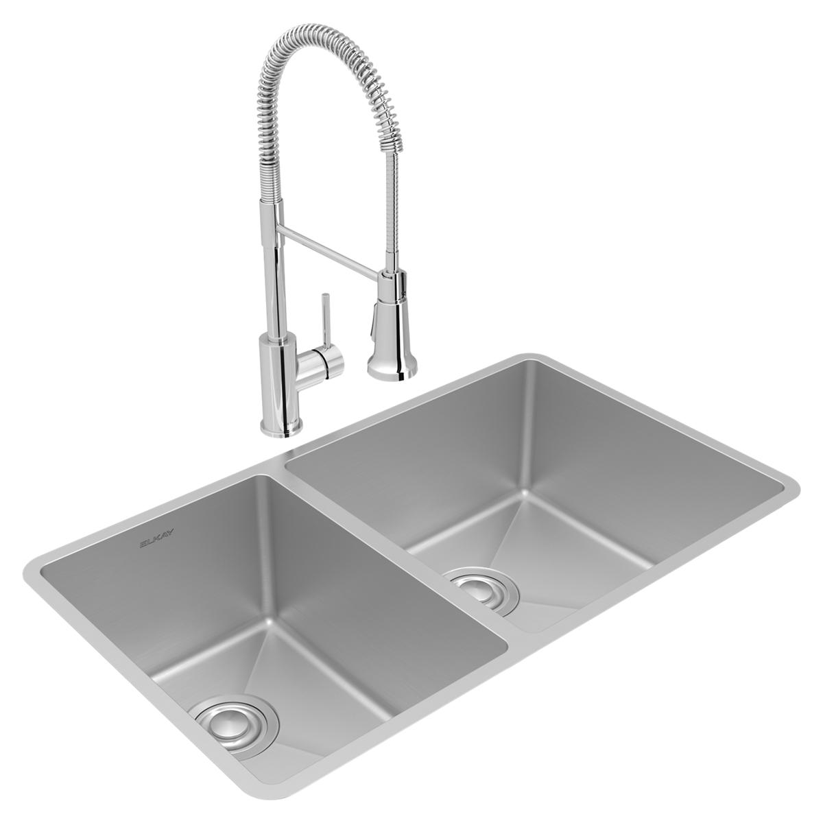 Stainless steel double bowl undermount sink with pull-down sprayer faucet and drain assembly.