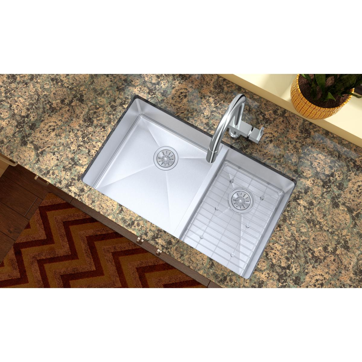Stainless steel sink bottom grid with rectangular slots, designed to fit 11" x 16" sink basin.
