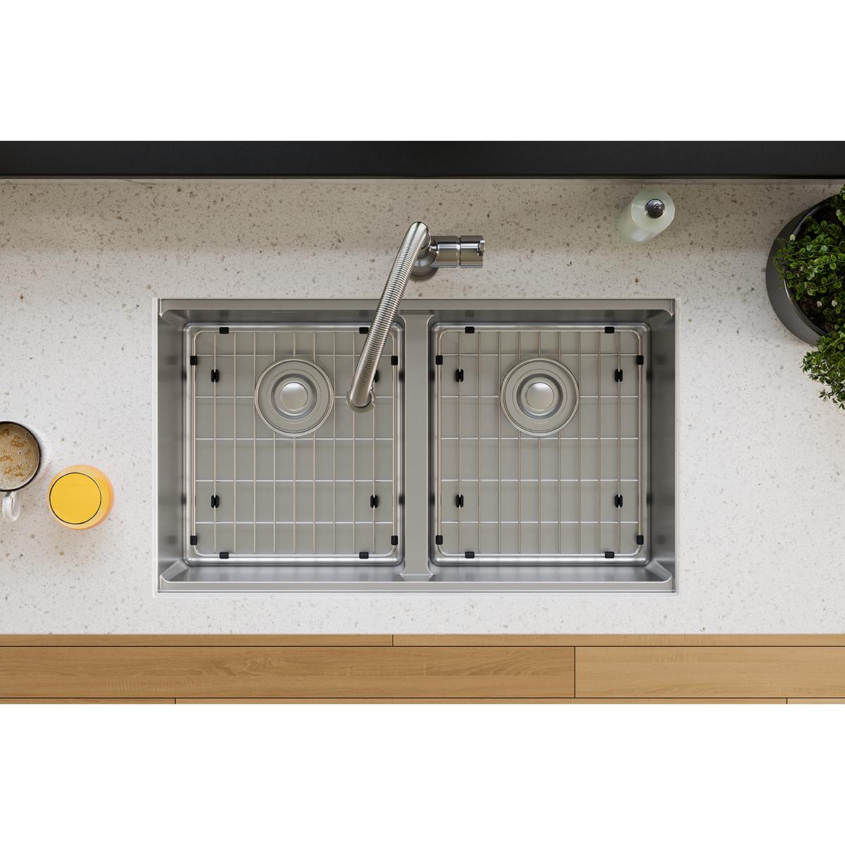 Stainless steel sink grid with vertical lines and mounting feet, sized to fit Elkay Crosstown sink basin.