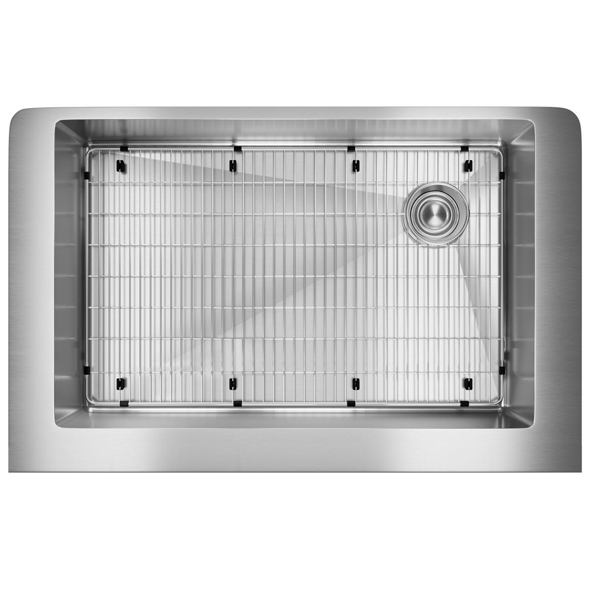 Stainless steel single bowl farmhouse sink with included grid and drain, viewed from above.