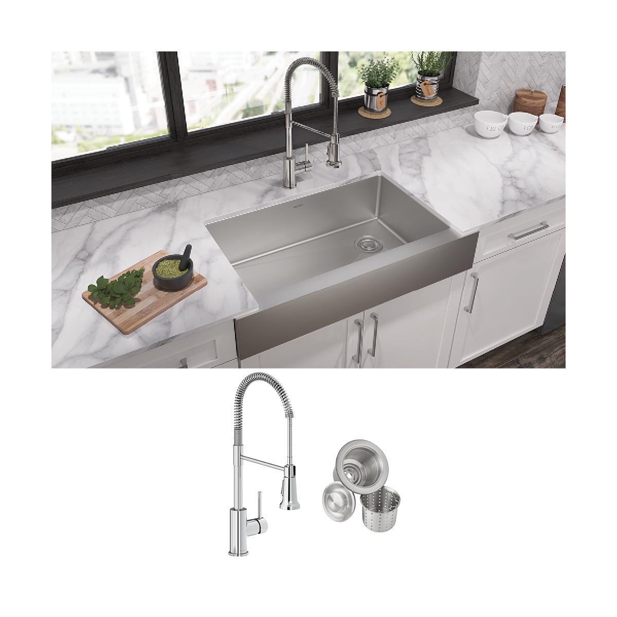 Stainless steel farmhouse sink installed in white kitchen with marble countertop, pulldown faucet, and strainer baskets shown
