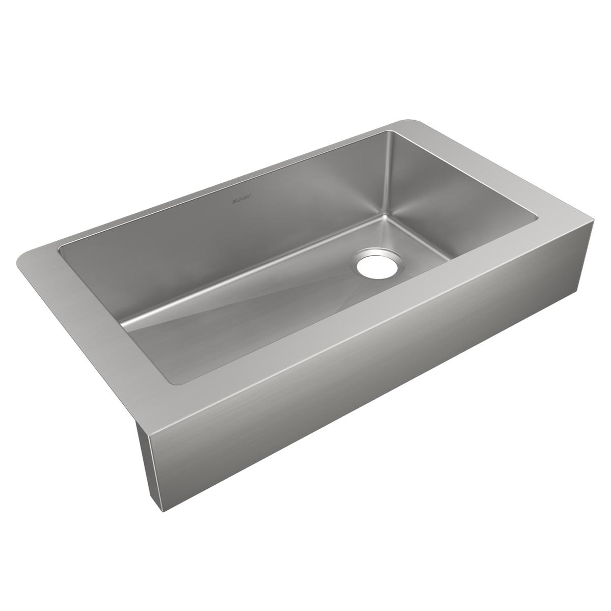 Stainless steel farmhouse sink with single rectangular bowl and front apron, drain hole visible.