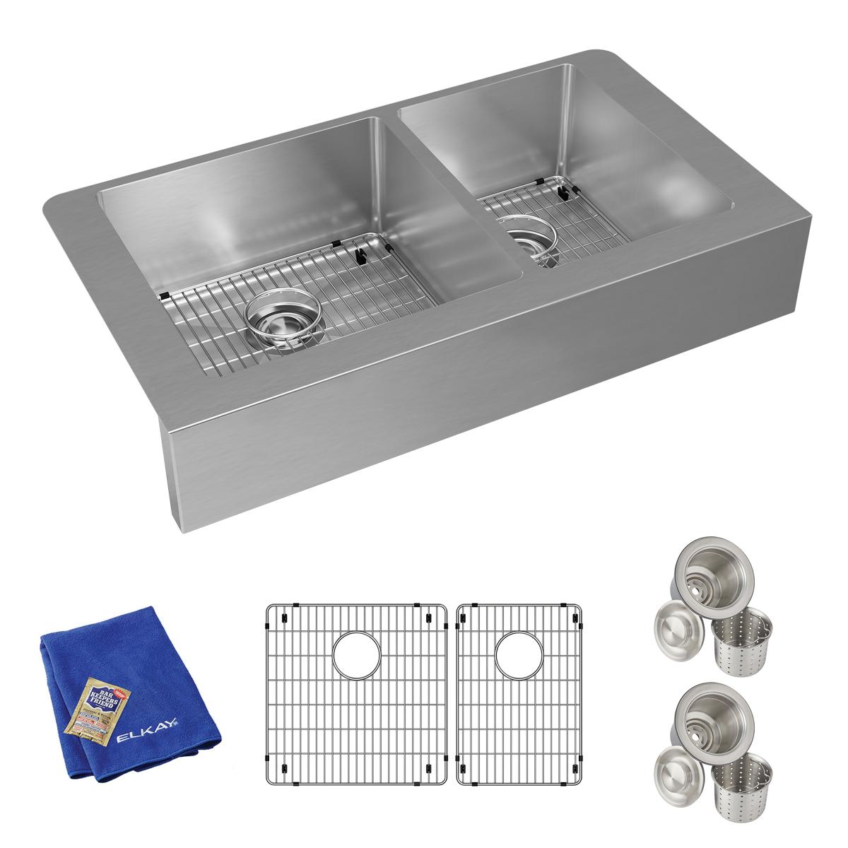 Stainless steel double bowl farmhouse sink with two grids, drain strainers, and blue cloth included.