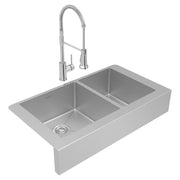 Stainless steel farmhouse sink with two unequal bowls and matching pull-down spray faucet.