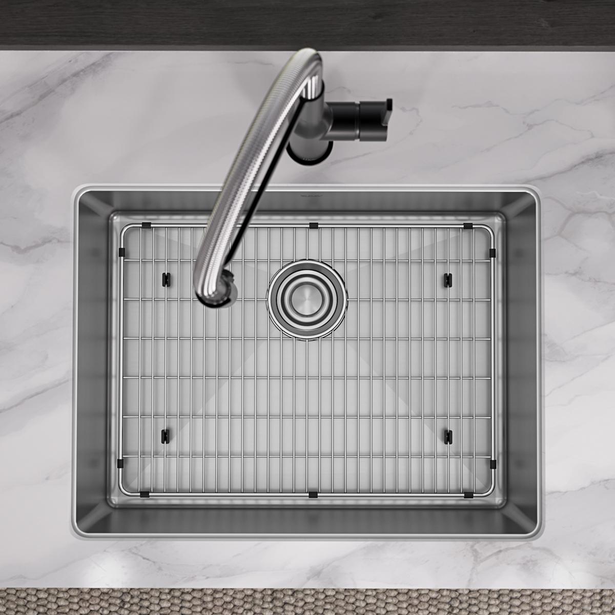 Stainless steel single bowl sink with one hole, drain strainer, bottom grid, and curved faucet, viewed from above.